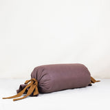 Bolster cylindrique en lin aux tons naturels, rembourré au kapok, avec liens de serrage, conçu pour le soutien en pratique douce et restaurative